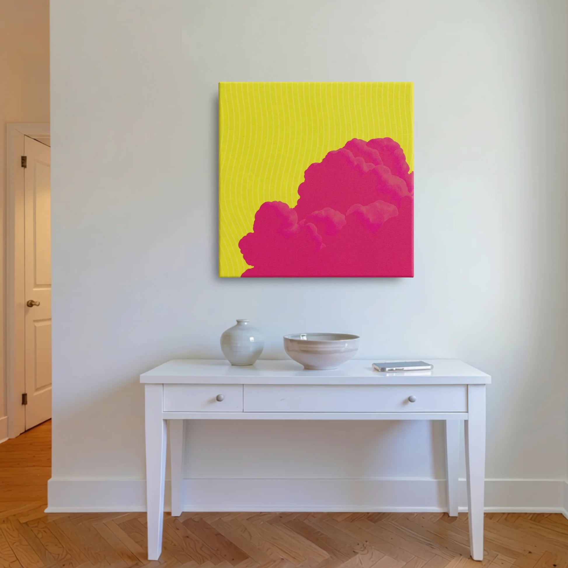 Art that gives you room to grow, pink cloud canvas in entryway with white console and warm timber flooring