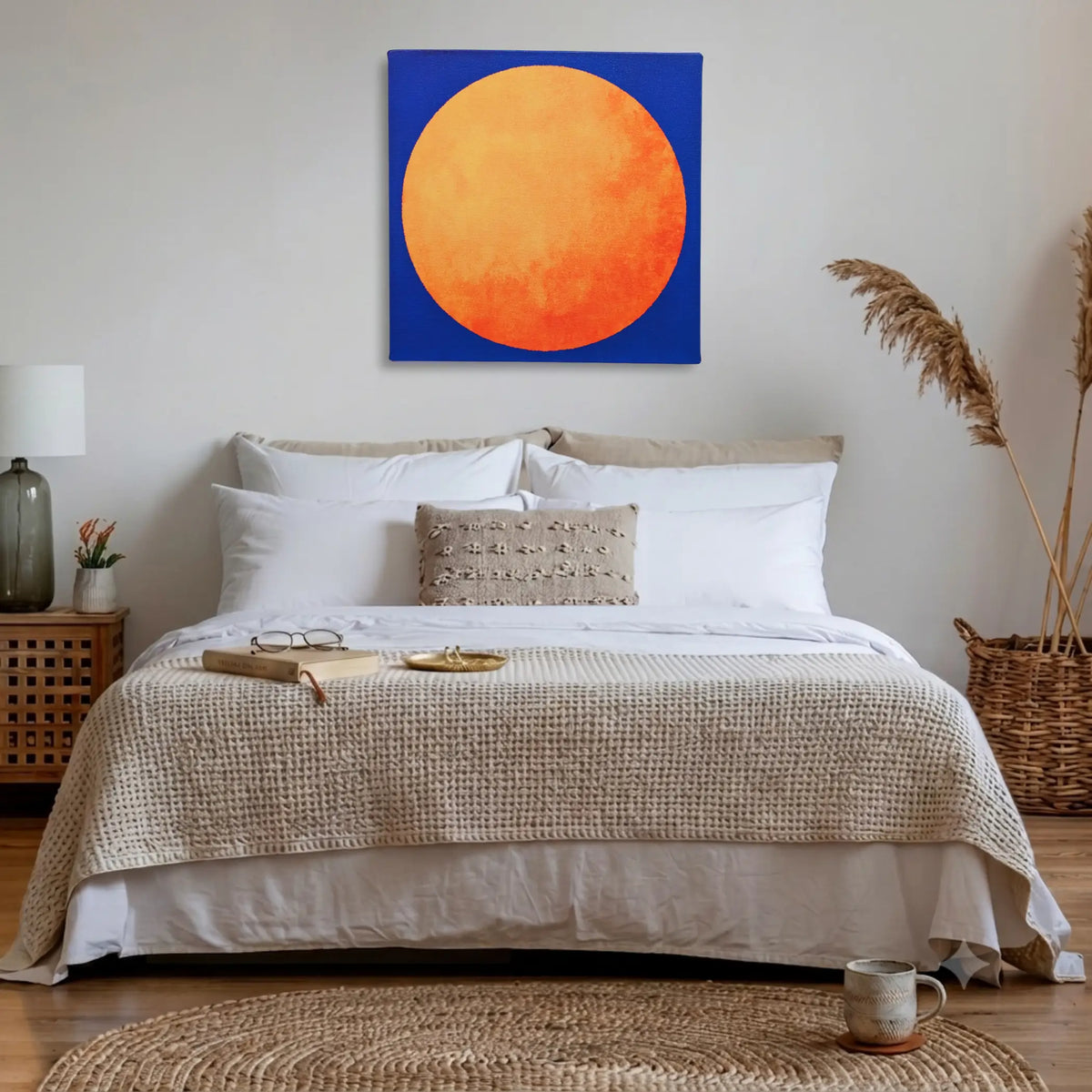 Bedroom wall art: RISE Sun canvas hung above the bed