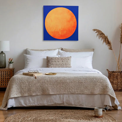 Bedroom wall art: RISE Sun canvas hung above the bed