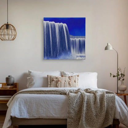 Blue abstract wall art above bed in modern bedroom with white sheets and natural textures