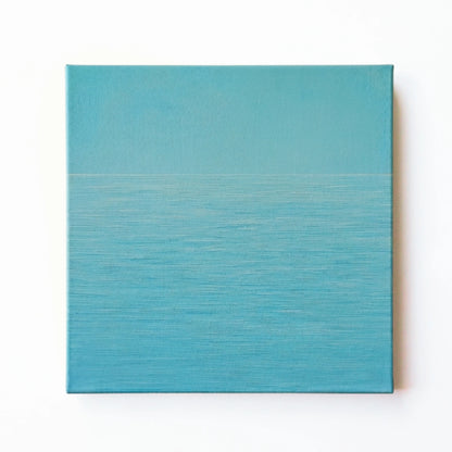 Blue ocean wall art print by RoomFruit, calm aqua water surface on square printed canvas, Australian made