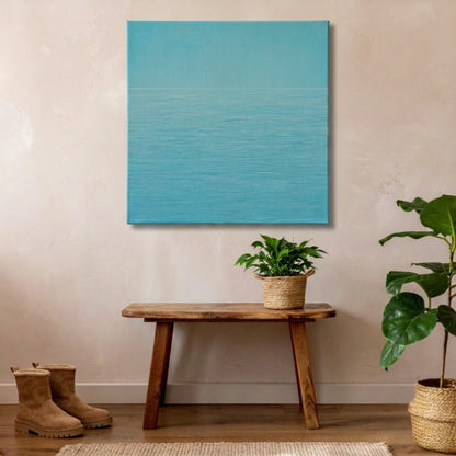 Calming bathroom wall art ocean canvas on teal feature wall creating tonal depth with warm timber flooring