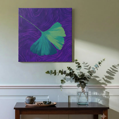 Calming wall art ginkgo leaf canvas in hallway with sage wall, dark timber side table, and warm natural light
