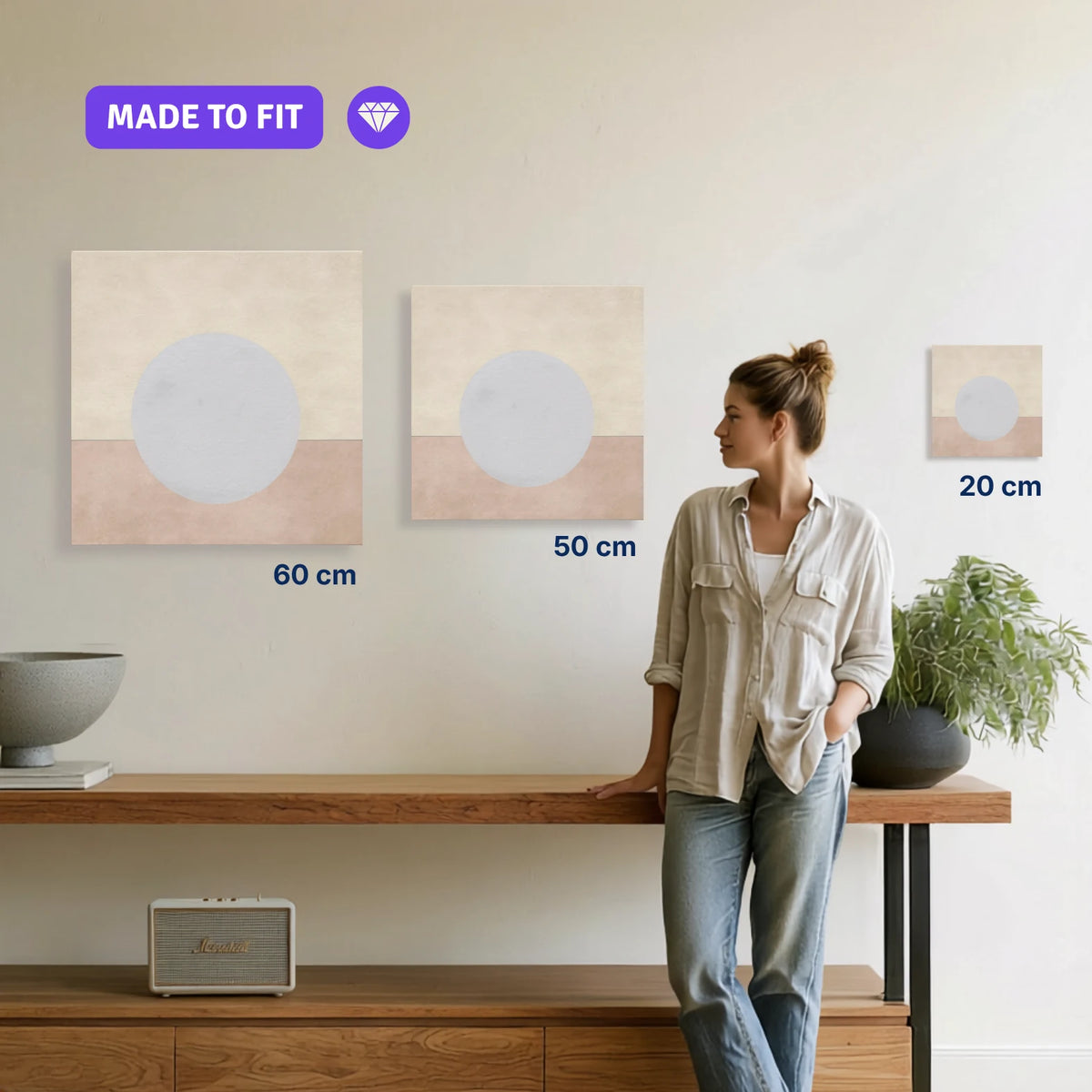 ENOUGH Moon canvas print in 20, 50 and 60 cm sizes shown to scale on a wall