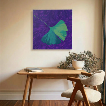 Green wall art ginkgo canvas in study with timber desk, potted plant, and warm natural light