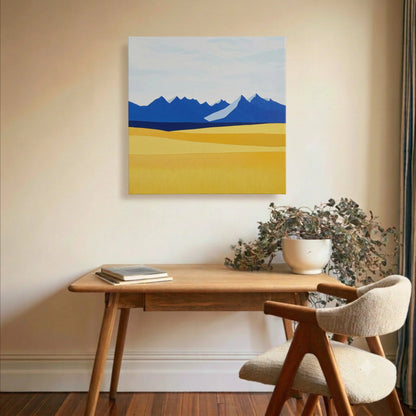 Inspirational wall art mountain canvas in study with timber desk, wooden chair, and natural light