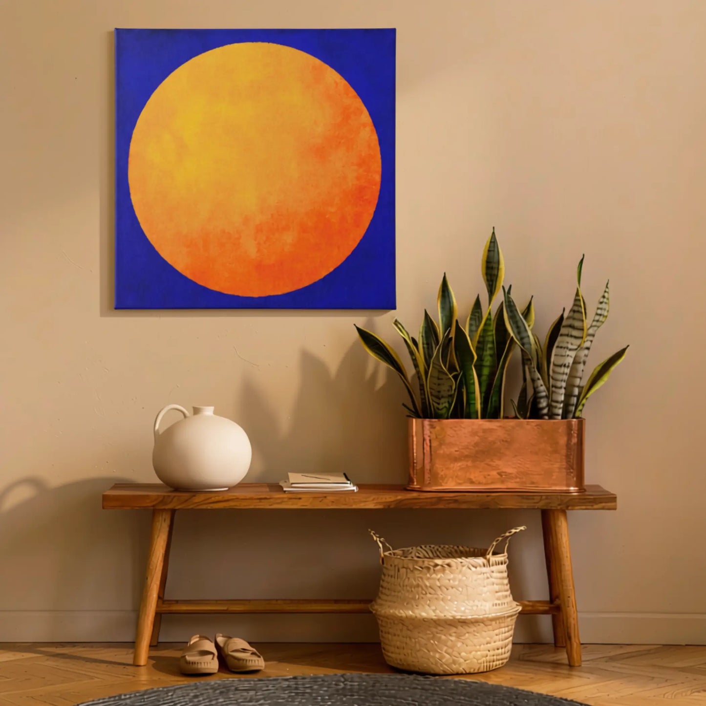 Inspirational wall art sun canvas in entryway with timber console table, woven basket, and indoor plant