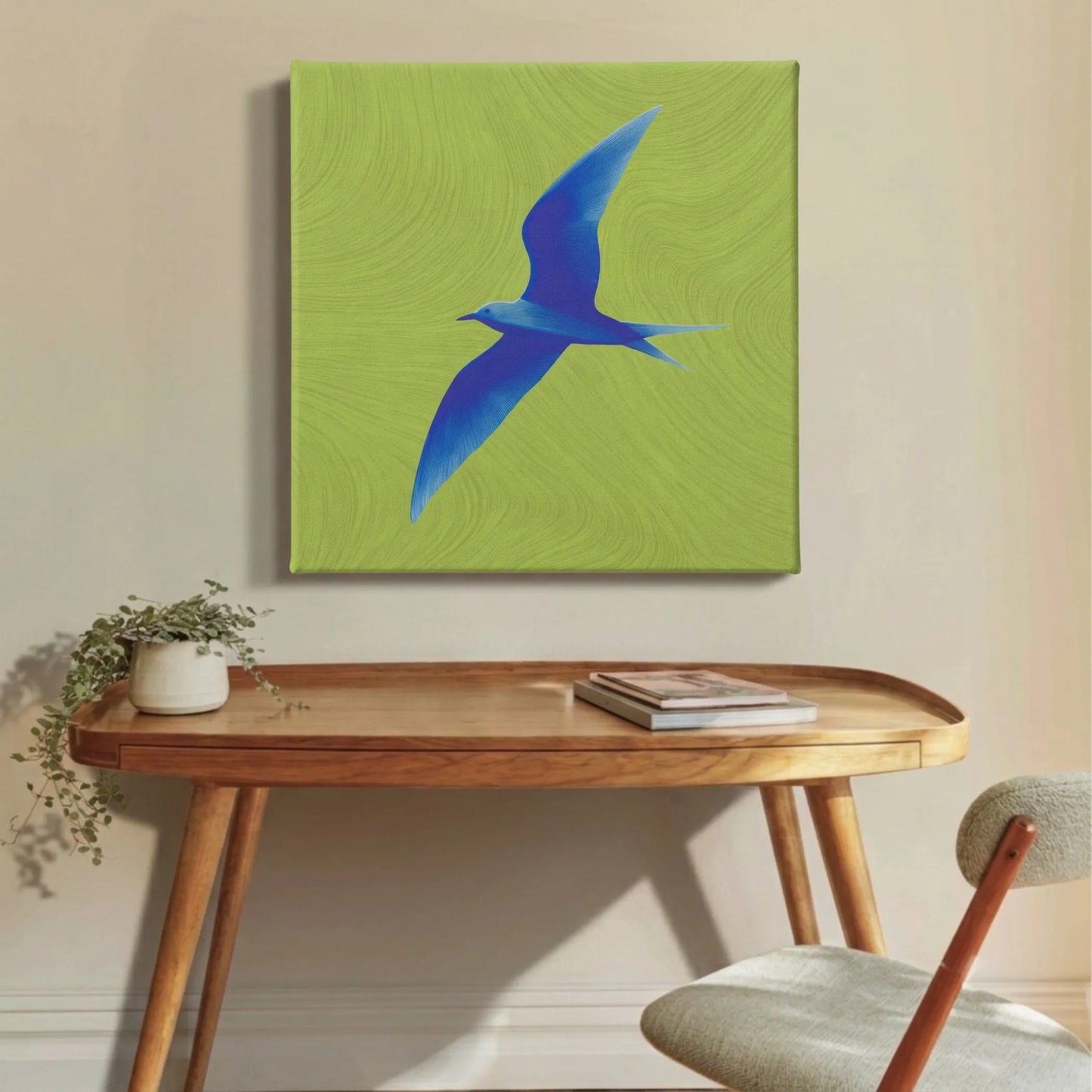 Motivational wall art bird canvas in apartment with brown leather sofa and warm timber flooring