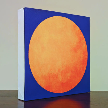 Ready to hang canvas wall art: RISE Sun shown at an angle with its deep 4 cm edge