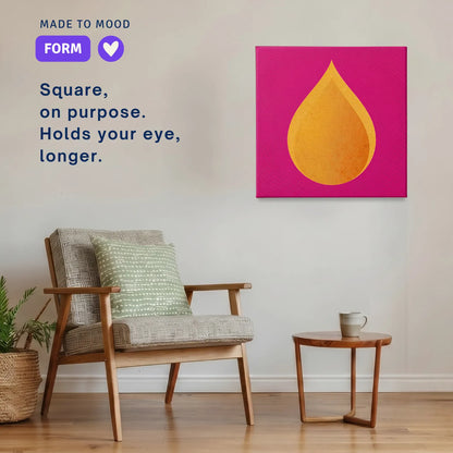 Square modern canvas wall art: RESTORE Fire hung beside an armchair in a calm room