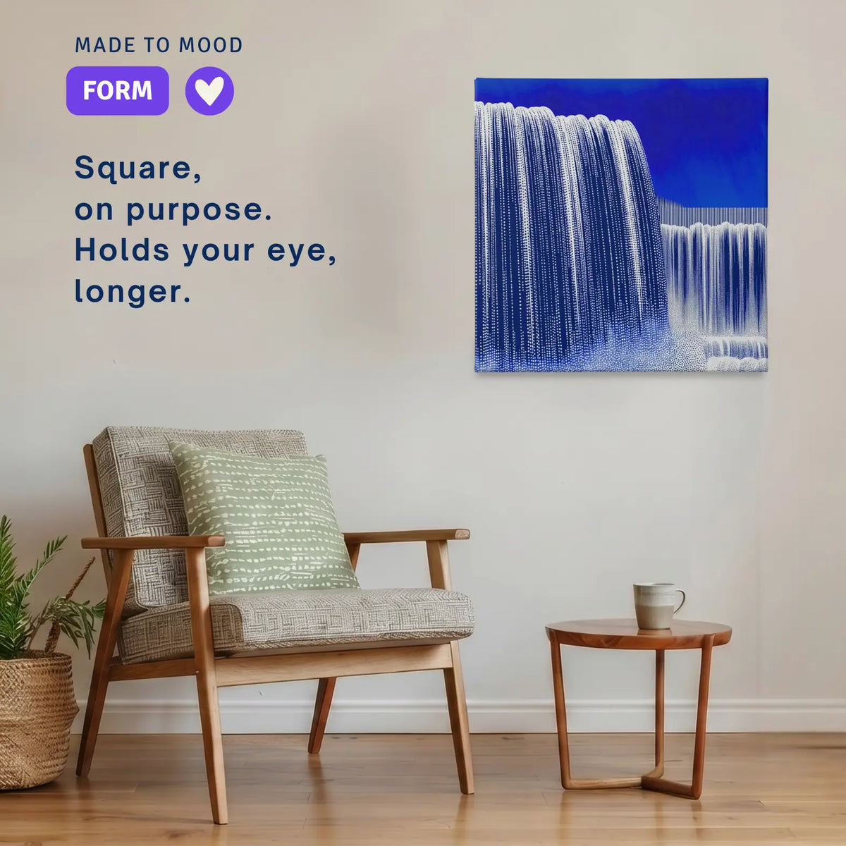 Square modern canvas wall art: POUR Waterfall hung beside an armchair in a calm room