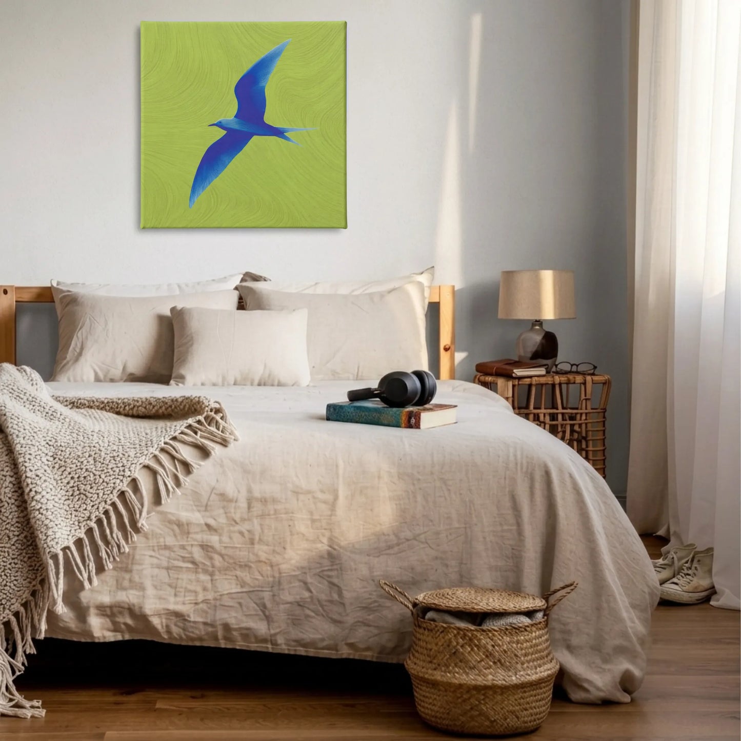 Uplifting wall art for bedroom, bird canvas above bed with neutral linen bedding and woven basket